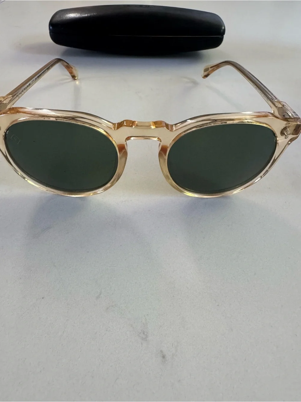 RAEN Remmy Sunglasses in champagne crystal with Dark Green Lenses